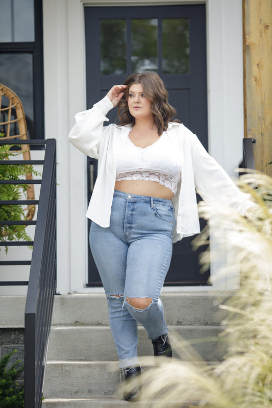 JadyK Model wearing a white Lace bralette on the steps of her porch in Nashville TN